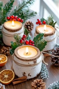 birch log candle holders wrapped in twine and sprigs of evergreen 3