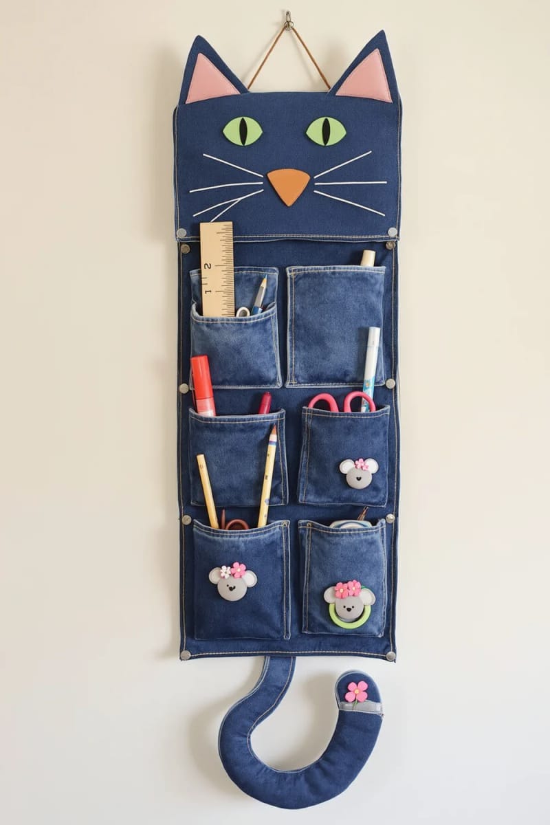 19 Creative Upcycled Home Decor Ideas to Refresh Your Space 23 denim jeans pockets fashioned into a hanging wall organizer 1