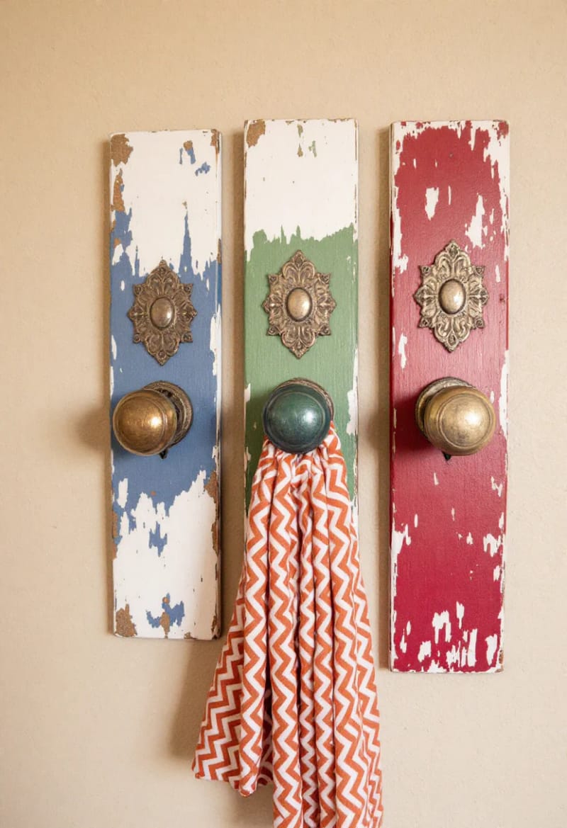 19 Creative Upcycled Home Decor Ideas to Refresh Your Space 37 old door knobs mounted as eclectic wall hooks for entryways 1