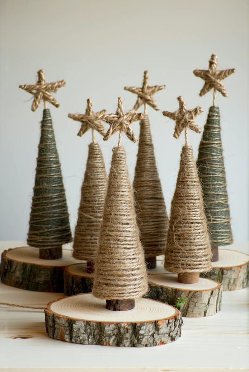twine-wrapped cone trees with wood slice bases and rustic star toppers 1