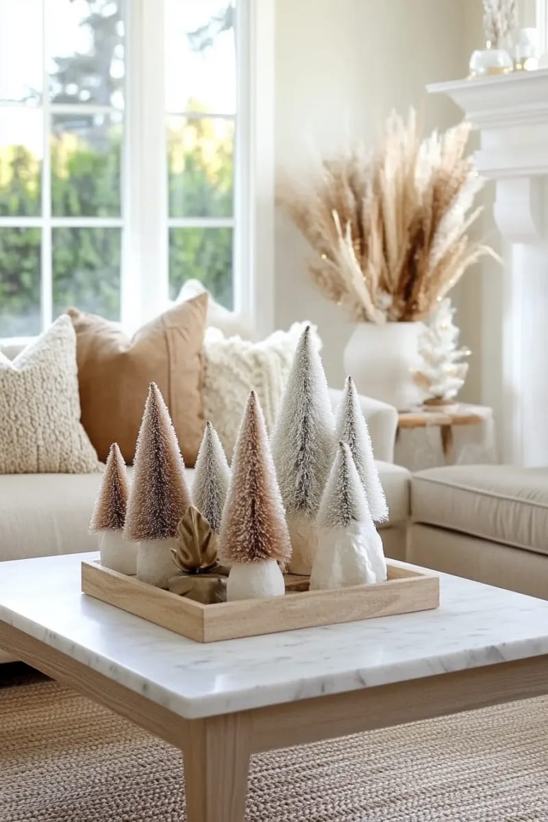 arrange bottle brush trees in soft beige and frosted white clusters 1