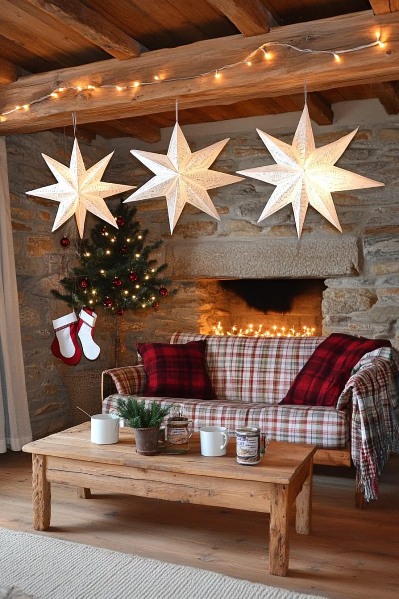 book page paper stars hung from exposed cabin rafters 1