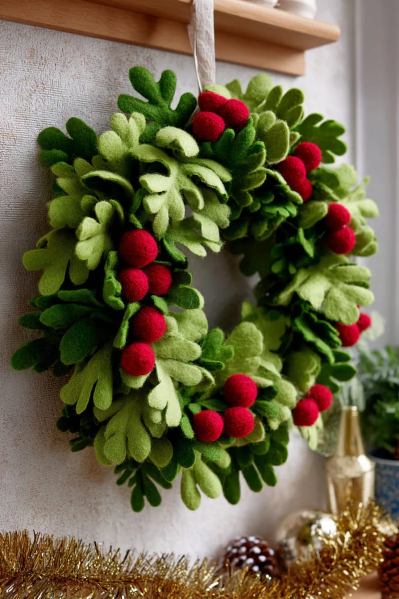 classic green felt wreath ornament with tiny red pom-pom berries 1