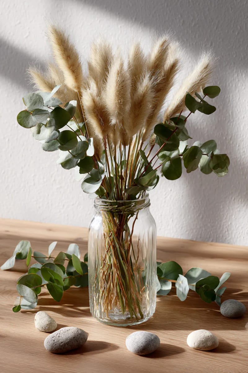 create a table centerpiece with dried pampas and eucalyptus sprigs 1