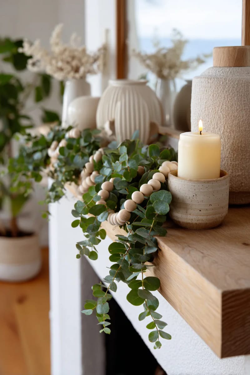delicate wooden bead garlands intertwined with eucalyptus sprigs 1
