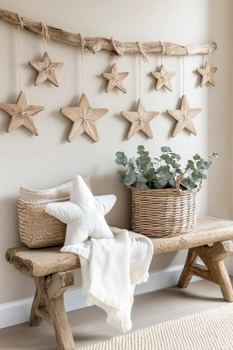 driftwood star garland hanging along a neutral wall 1