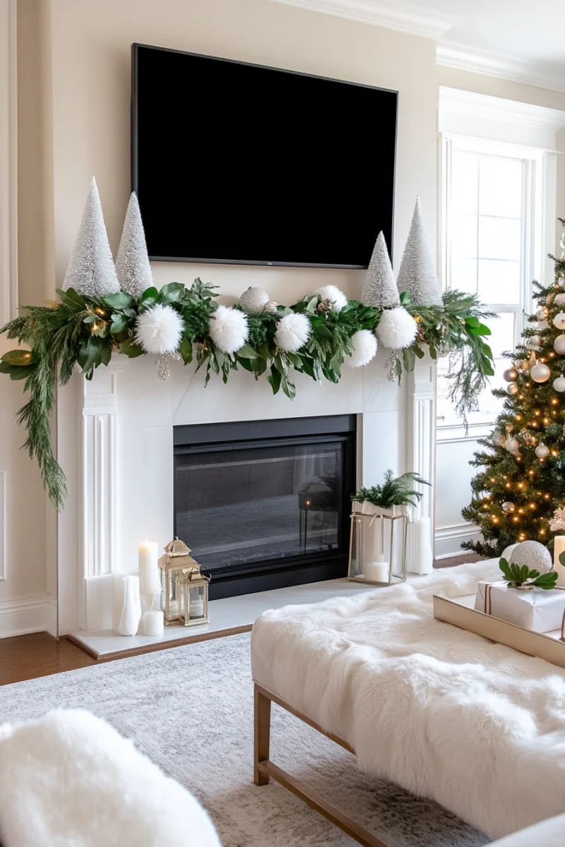 fluffy white pom-pom garland strung above a modern holiday mantle 1