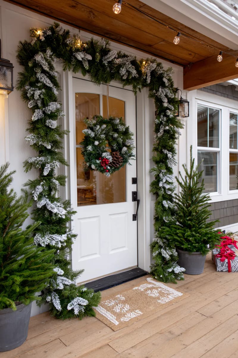 15 Christmas Decor Ideas for a Front Porch DIY That’s Simple but Stunning 28 frame your front door with faux snow-tipped garland and twinkling string lights. 1