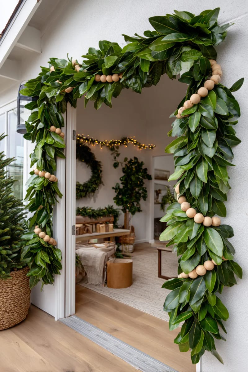 garland of bay leaves and wooden beads draped over entryways 1