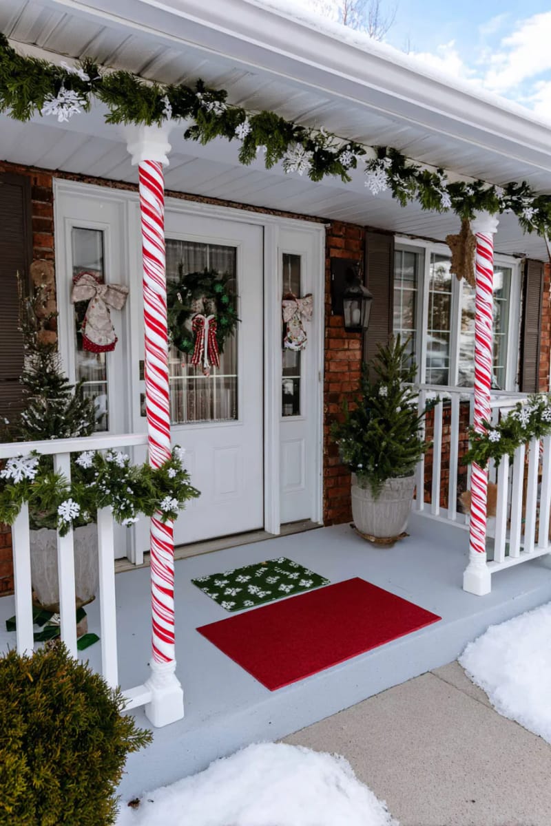 giant candy cane columns made from pool noodles and red tape 1