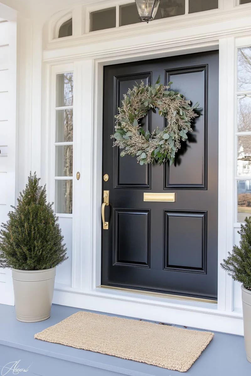 23 Elegant Christmas Decor Ideas You’ve Never Seen Before 78 minimalist wreath of eucalyptus and gold leaf for a sophisticated front door 1