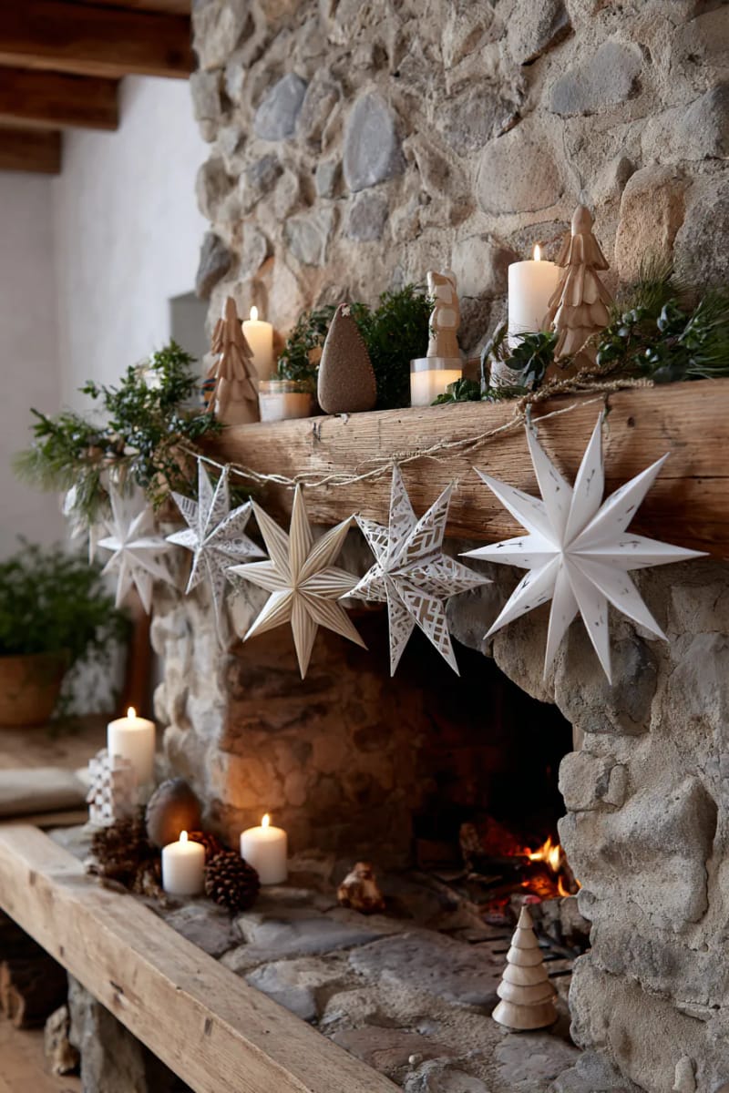 nordic-inspired paper star garland draped across a rustic fireplace 1
