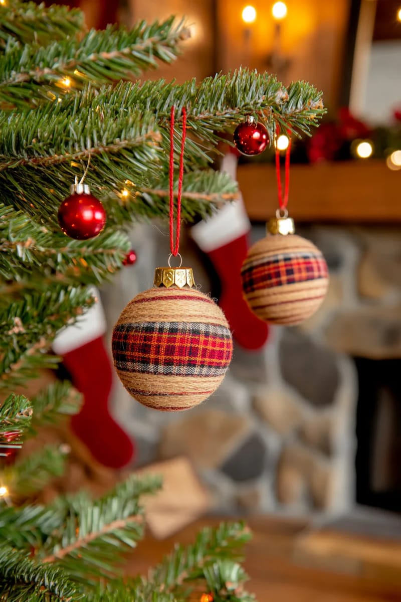 old wooden spools wrapped in plaid fabric for tree ornaments 1