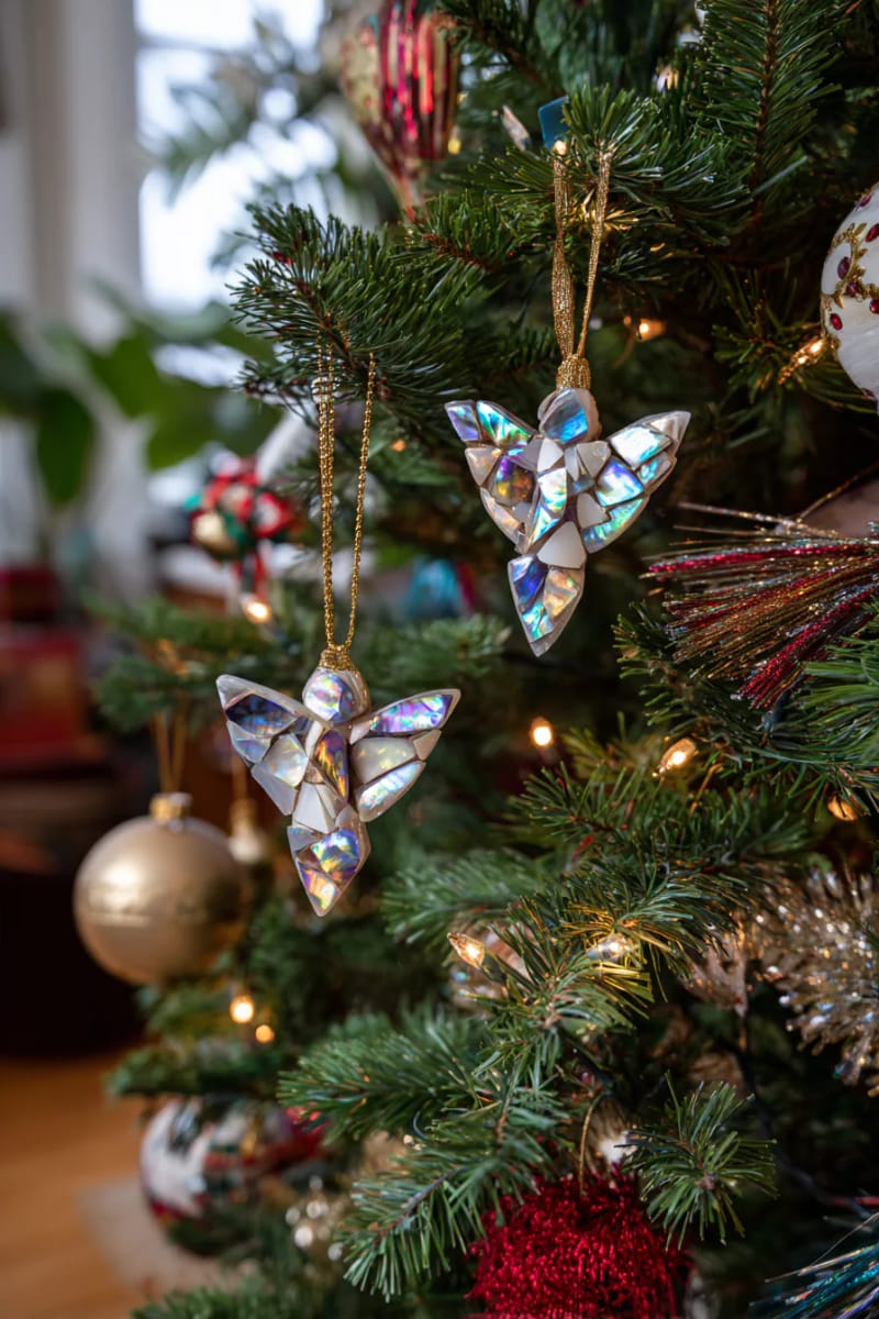 29 Upcycled Christmas Crafts For Unique Holiday DIY Projects 57 recycled cd mosaic angels shimmering on the christmas tree 1