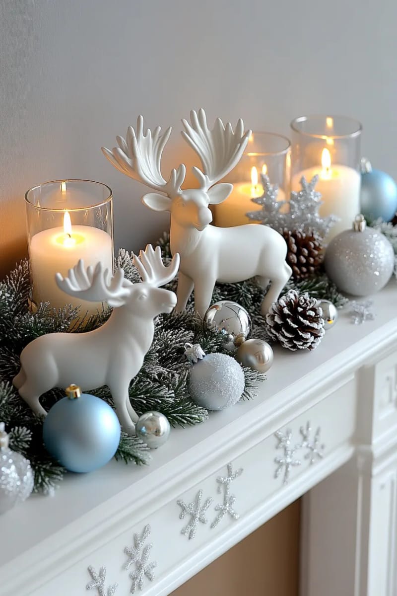 white ceramic moose figurines perched on a snowy mantel display 1