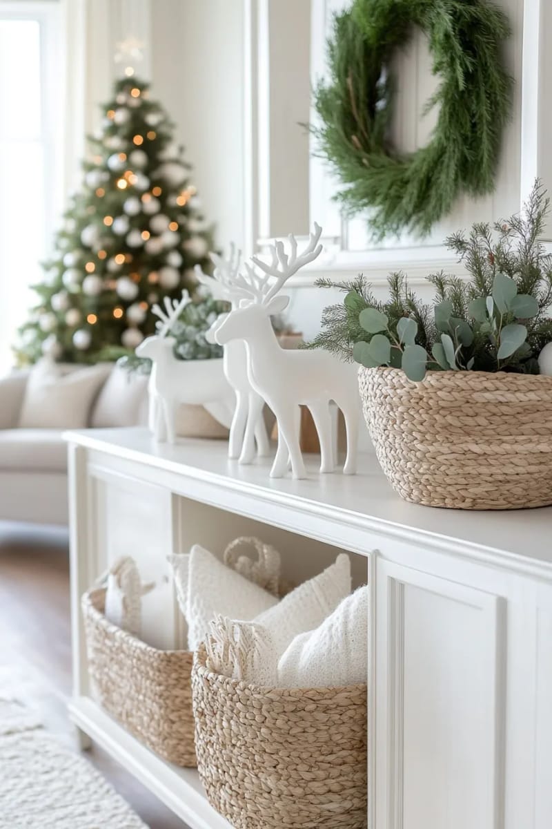 white ceramic reindeer paired with eucalyptus sprigs on the sideboard 1