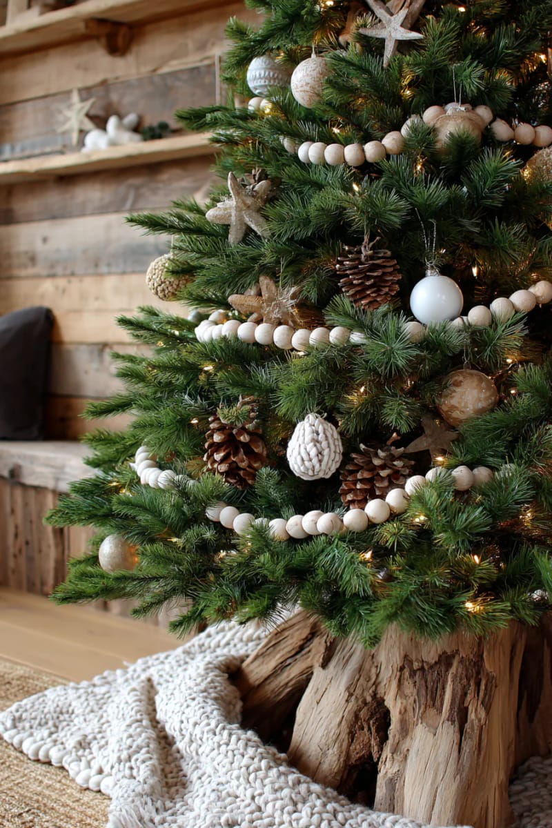 wooden bead garlands draped across a rustic christmas tree 1