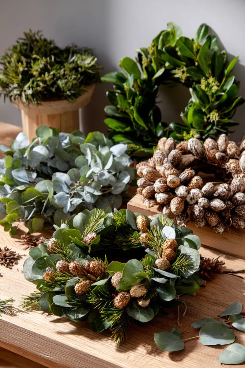 wreaths made from eucalyptus, pine, and preserved seed pods 1