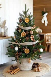 decorate a rustic christmas tree using dried orange and star anise ornaments 4
