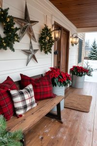 hanging galvanized stars with greenery above the entryway 31