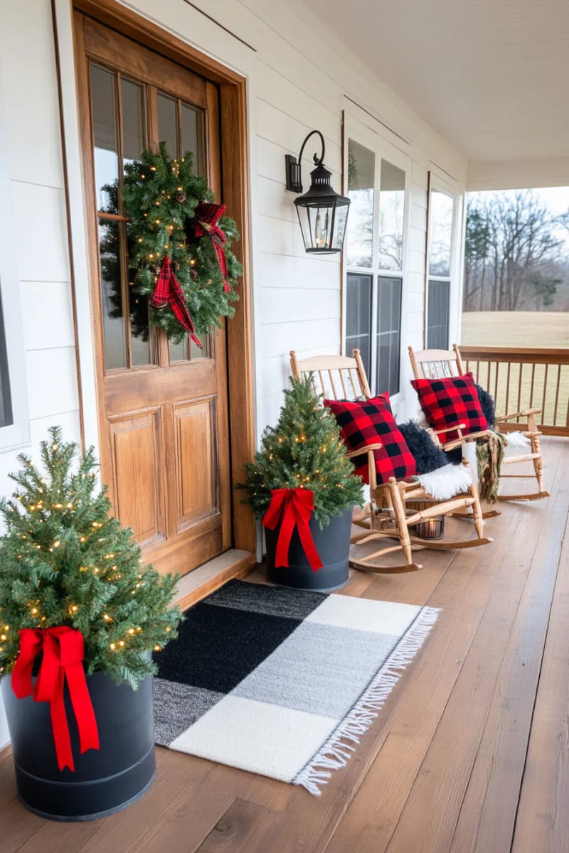 15 Simple Farmhouse Christmas Front Porch Decor Ideas 4 mini pine tree cluster in galvanized farmhouse buckets with plaid ribbon bows 1