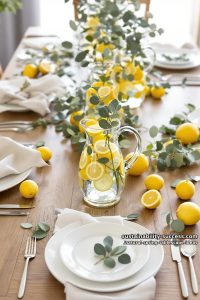 lemon and eucalyptus accents arranged in clear glass pitchers 20
