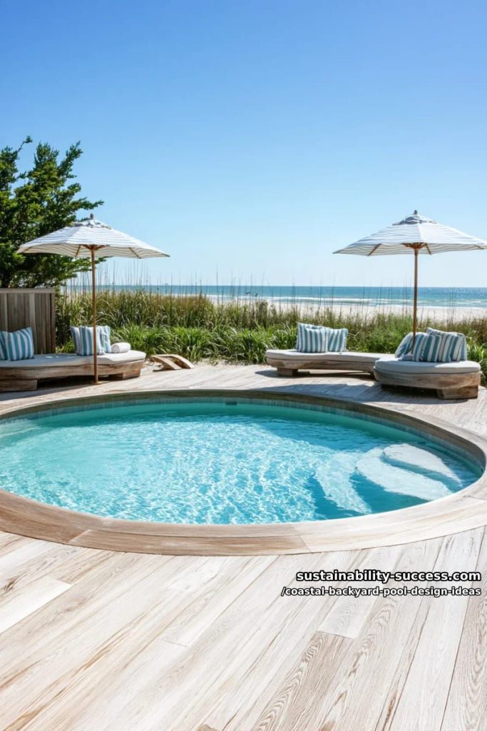 circular pool deck with driftwood benches and striped umbrellas 11