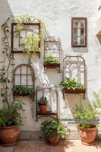 iron window frames repurposed as wall-mounted plant shelves 7
