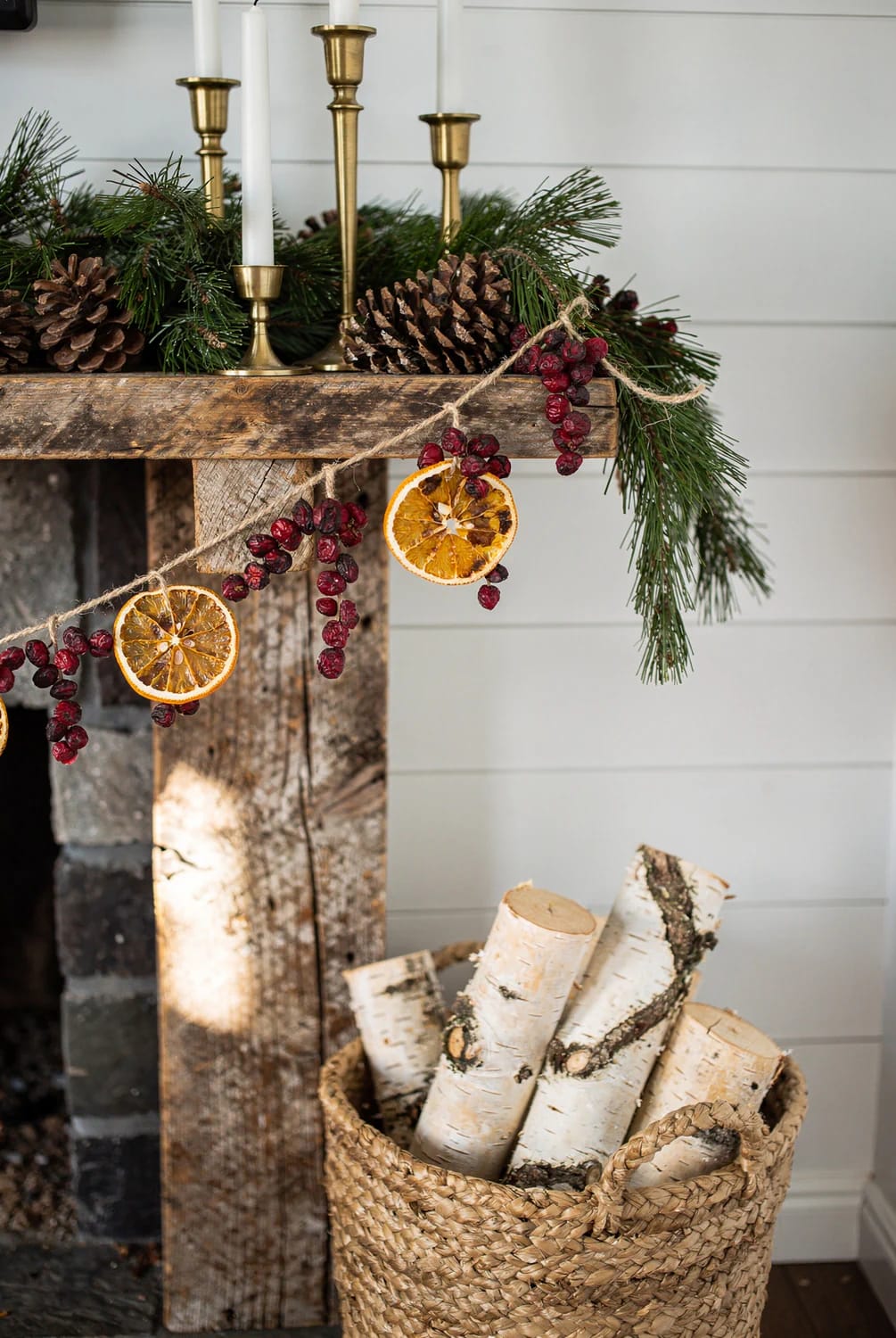 Dried Cranberry Garland for a Rustic Mantel: Ideas That Survive Past New Year 6 dried orange wheels break up the cranberry red 1