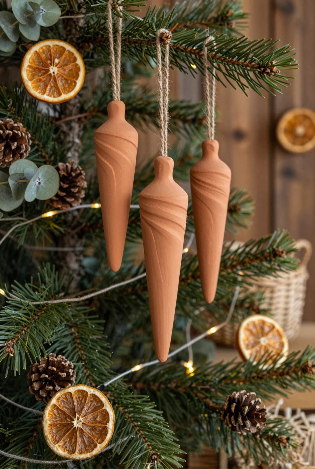 Terracotta Clay Christmas Ornaments for an Earthy Tree 13 tapered terracotta icicles hung in threes 1